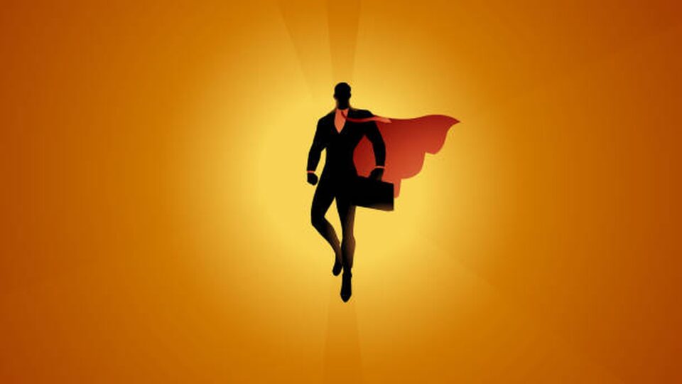 Image of a man in a business suit flying with a cape in the sky.