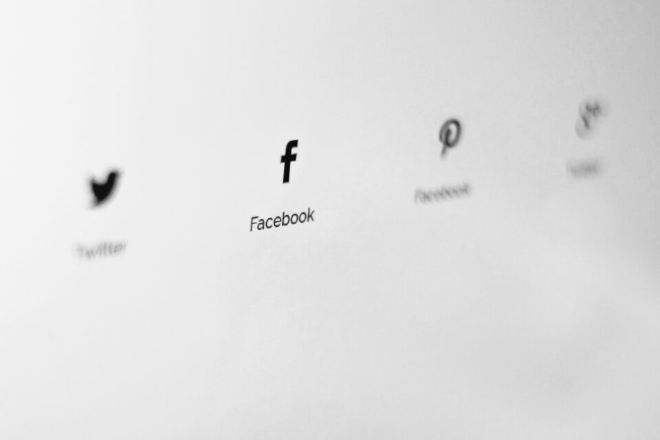Social media icons on a white background.