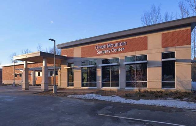 An exterior photograph of GMSC, a single-story brick building, finally open for business.