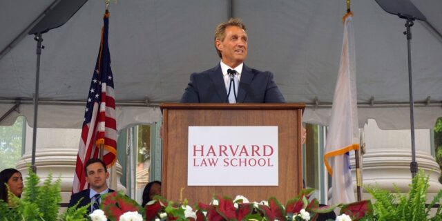 Senator Jeff Flake speaking from a podium during Class Day.