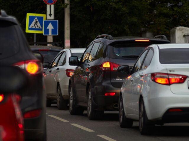 Cars on road during traffic jam. 