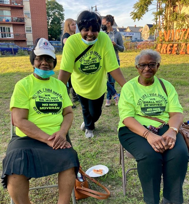 Betty Lewis, center, and Annie Gordon, right, at the Fairlawn Apartment complex in City Life t-shirts.