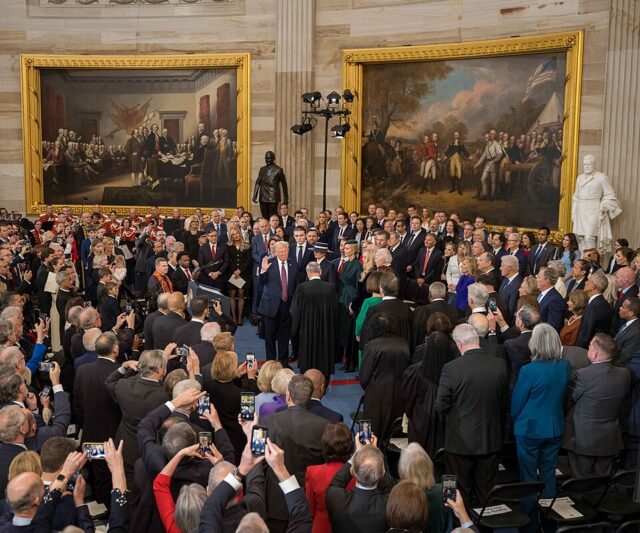 Trump takes the oath of office for his second term, surrounded by family, politicians, and tech billionaires.