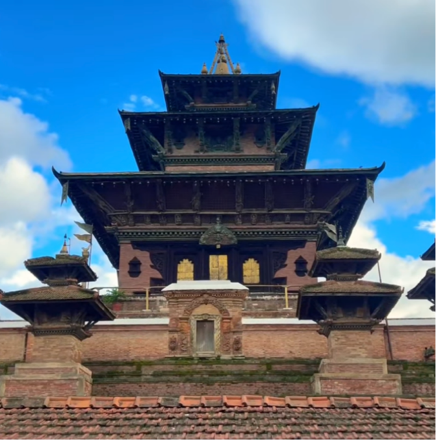 Taleju Bhawani Temple during the daytime surrounded by a blue sky