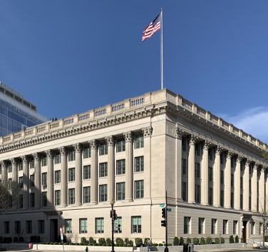 The U.S. Chamber of Commerce building with an American flag at full mast.
