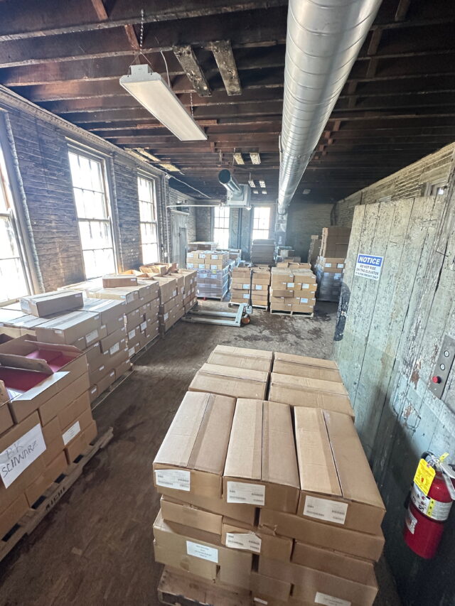 Boxes of books in a warehouse.