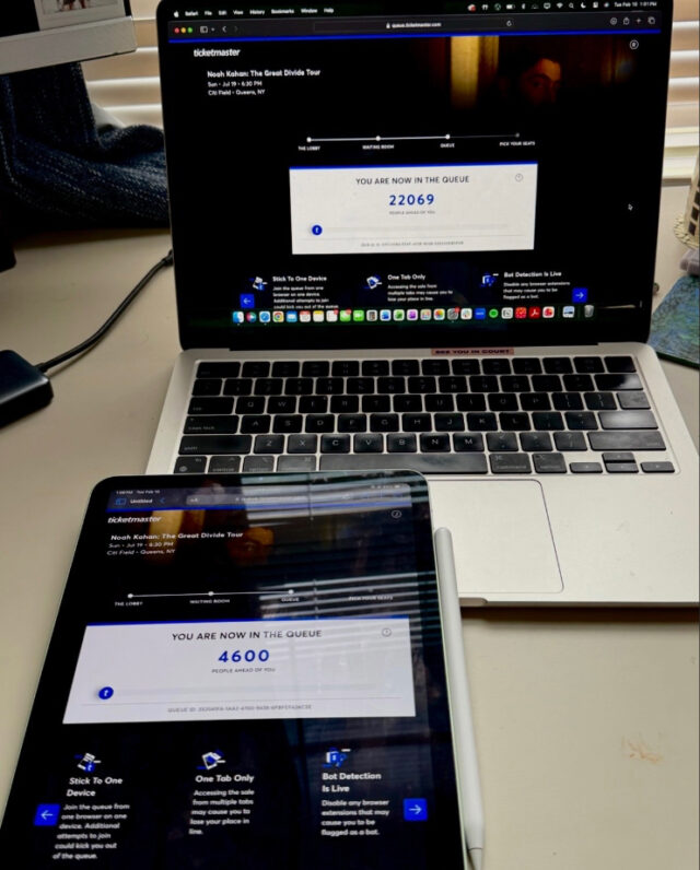 wo devices display a Ticketmaster queue for the "Noah Kahan: The Great Divide Tour." The laptop shows a queue number of 22,069, while the tablet shows 4,600.